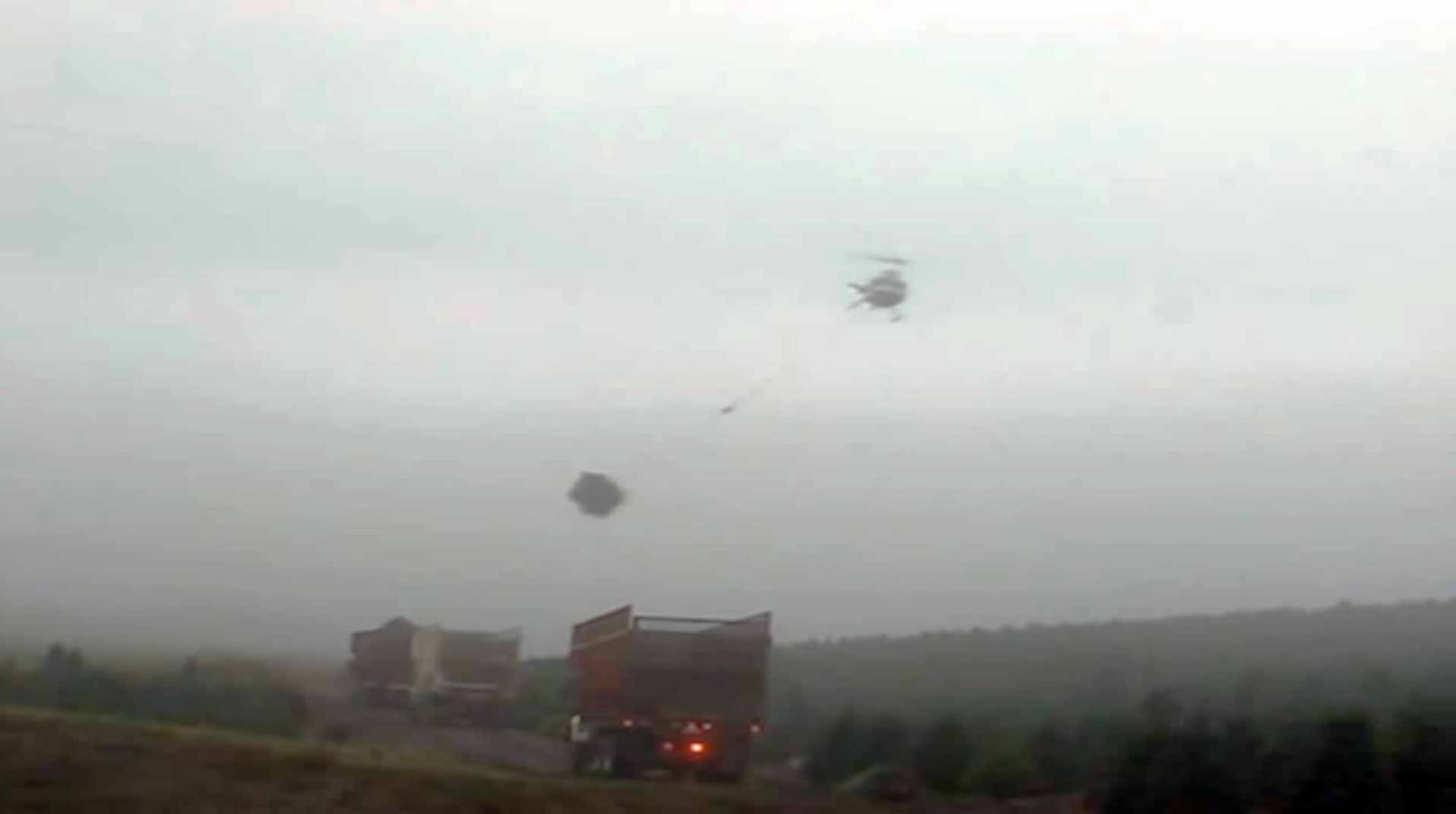 helicopter pilot is a master at his job harvesting helicopter pilot is a master at his job harvesting