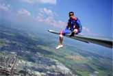 A Moment Of Relaxation On The Wing Of A Glider