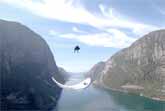 Acro Paragliding Over A Fjord In Norway