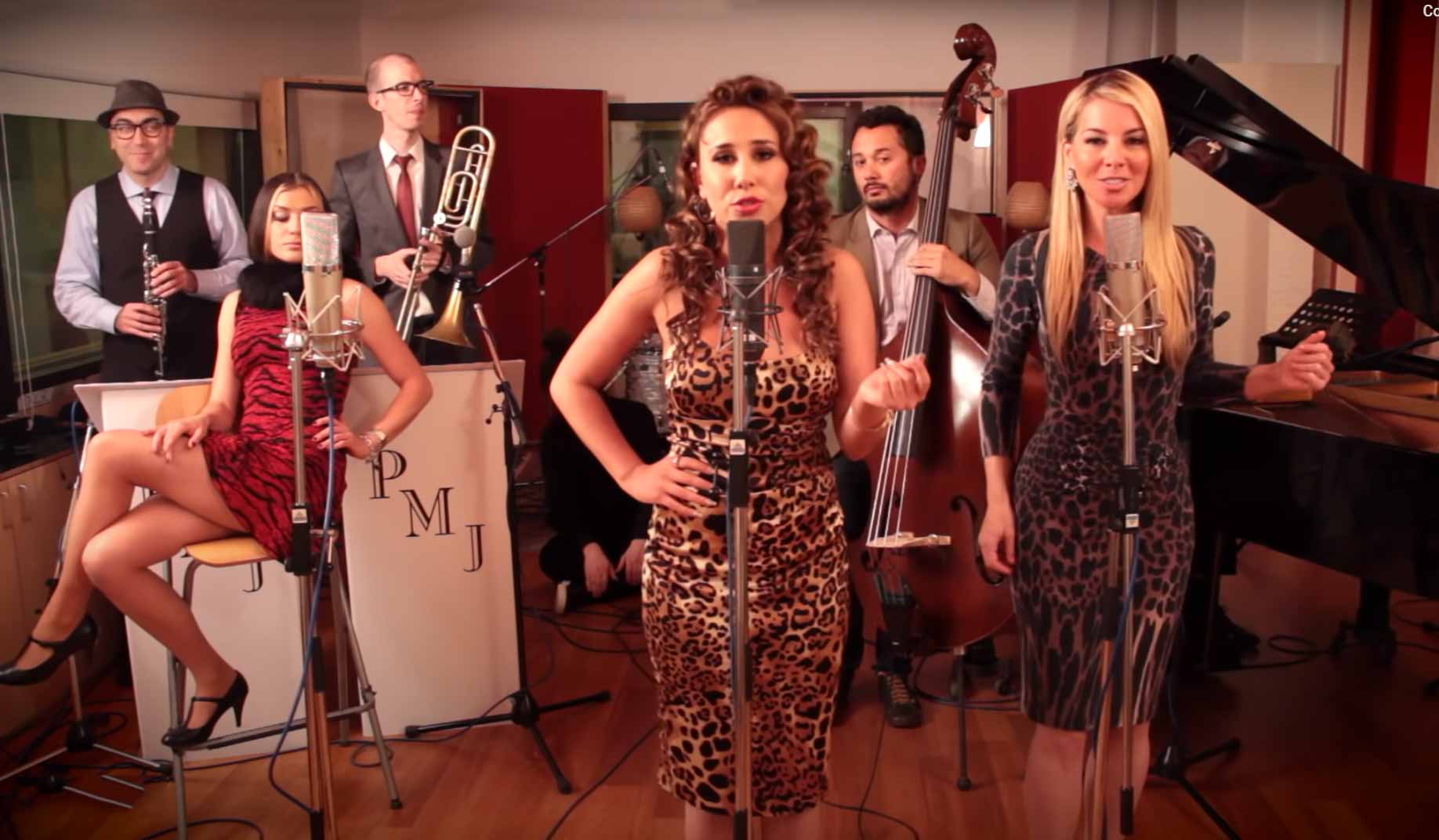 Performed by Postmodern Jukebox,  Meghan Trainor’s 'All About That Bass' in the style of PMJ ft. Kate Davis.