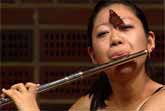 Butterfly Joins Flute Player Performance