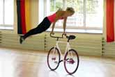 Dancing With A Bicycle - Nicole Frybotova