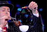 Magician Denis Lock Performs Bubble Blowing Skills - London Palladium 2016