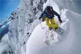 Nicolas Falquet Skiing Off a Peak At Les MarÃ©cottes in Switzerland