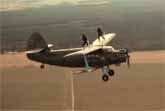 Playing Tennis On The Wing Of A Flying Airplane