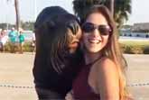 Pretty Girl Posing With A Humorous Seal