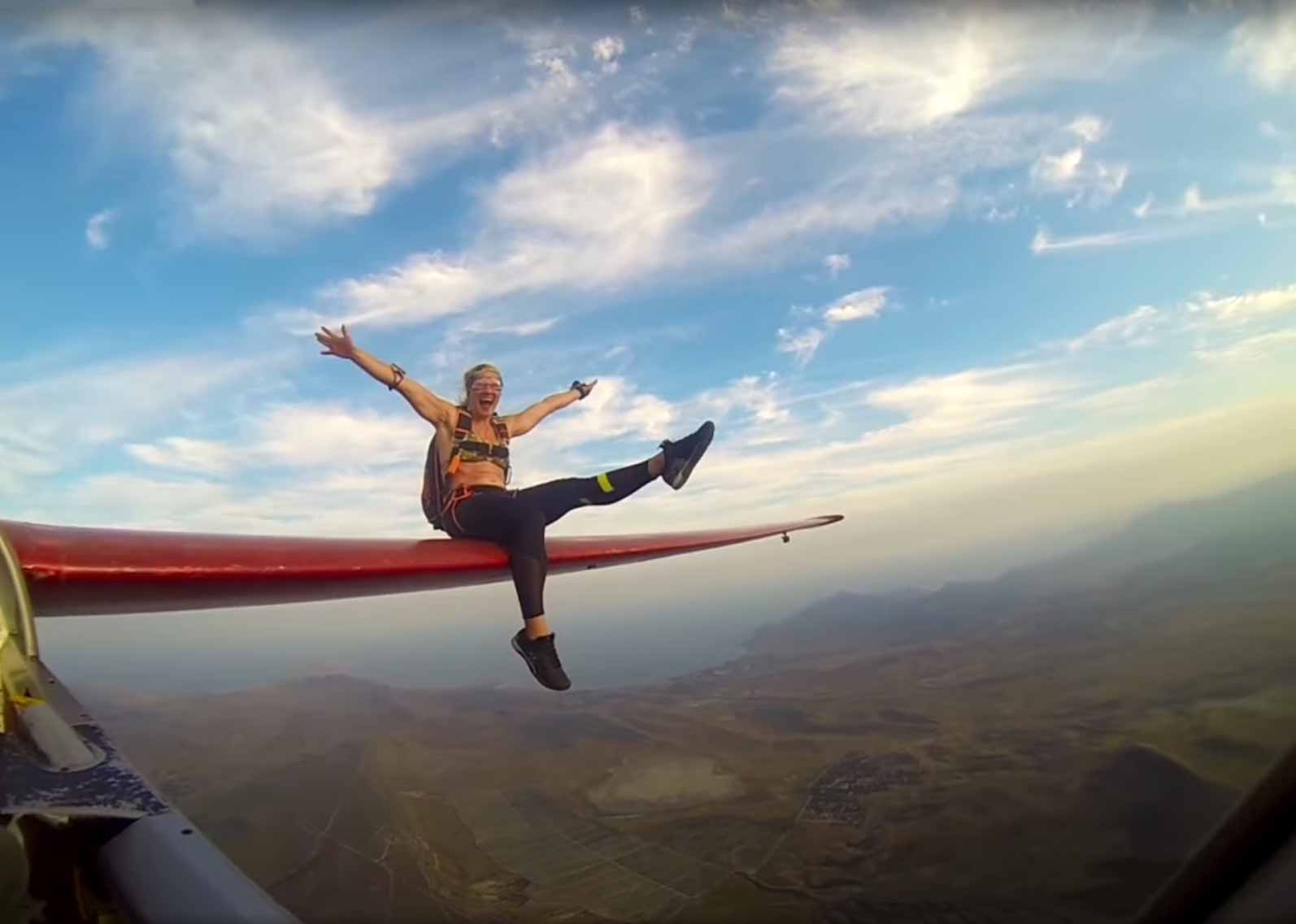 Riding The Wing Of A Glider Airplane