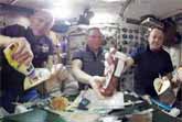 Russian And American Crew Eating Tacos In Space - 360 Degree Video