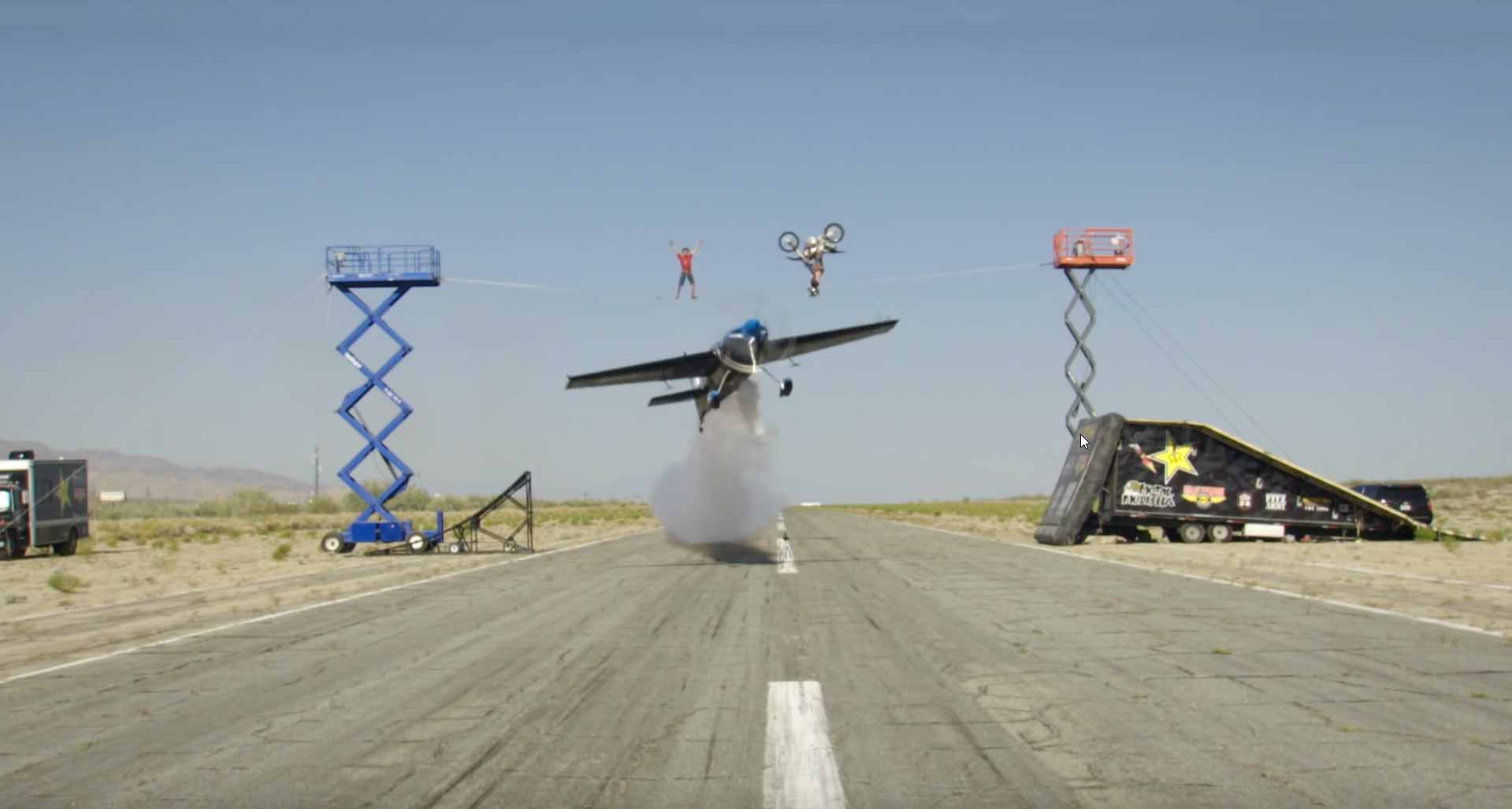 World First Plane Flies Under Back Flipping Motorcycle And Highliner